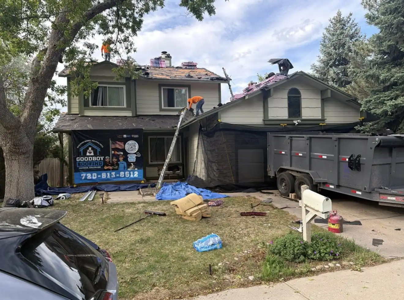 GoodBoy Roofing crew working on a roof