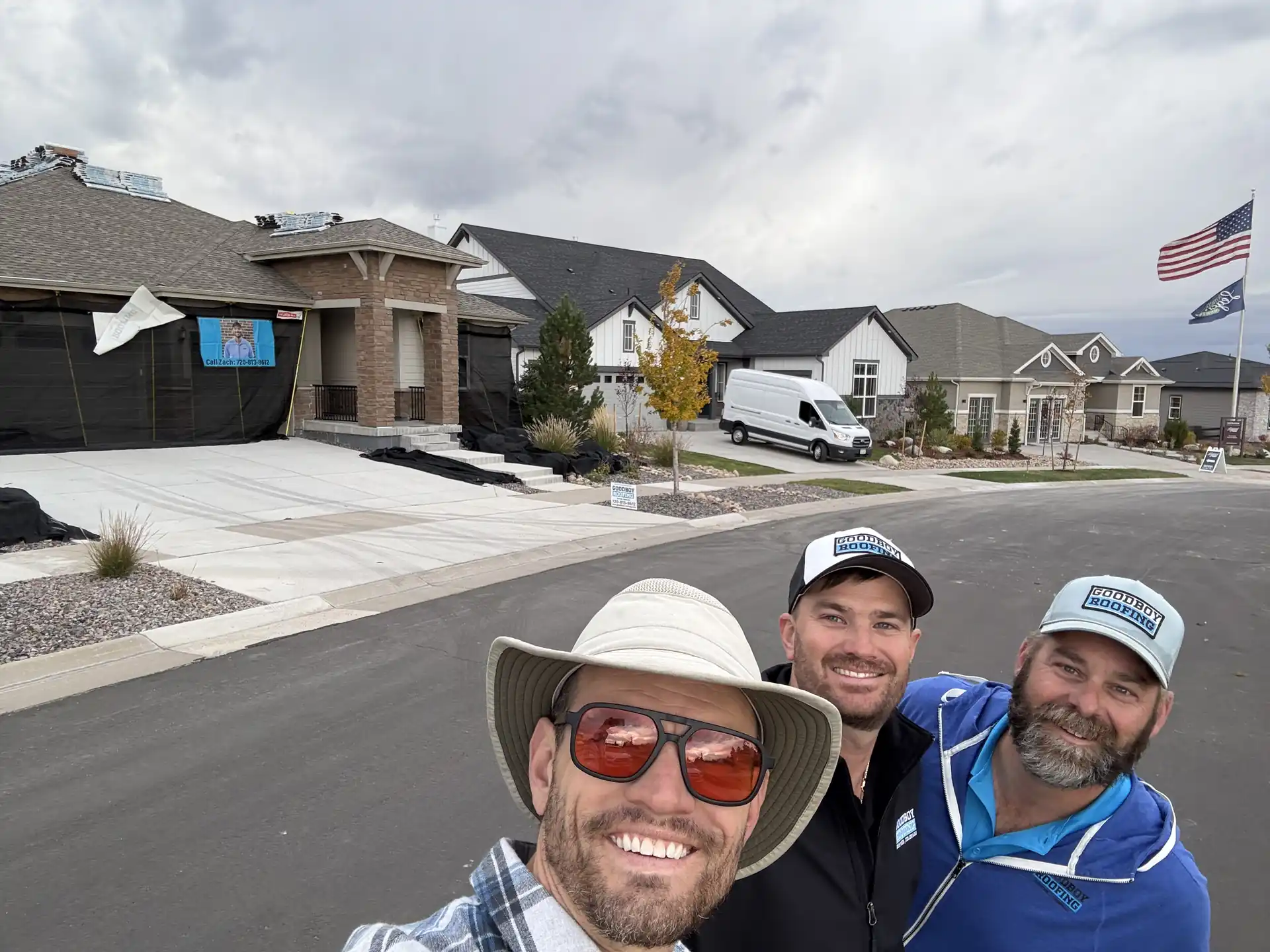 GoodBoy Roofing team in front of a project