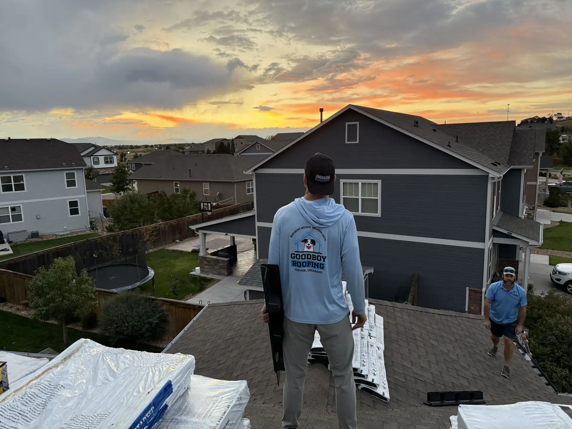 GoodBoy Roofing team member on a roof